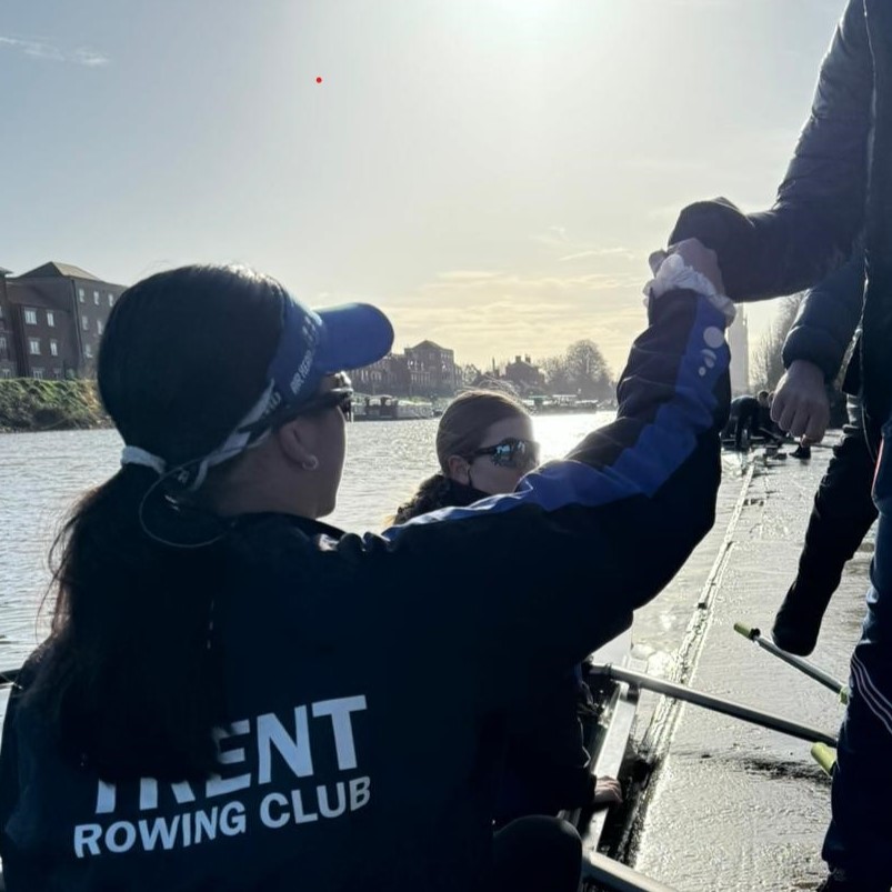 Fistbump for rower about to race